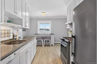 1 Toms Point Lane #17G, Port Washington, NY 11050 - Photo 3