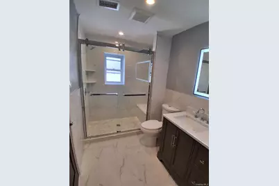 84 Holland Avenue, Elmont, NY 11003 - Photo 9