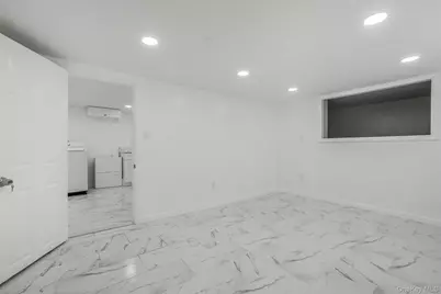 1445 Rosser Avenue, Elmont, NY 11003 - Photo 35