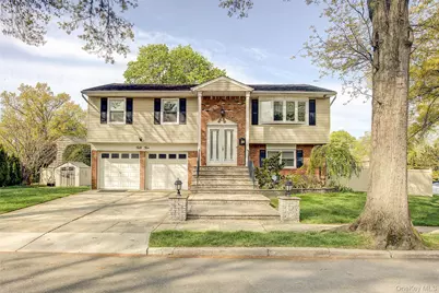 55 Duncan Drive W, Westbury, NY 11590 - Photo 1