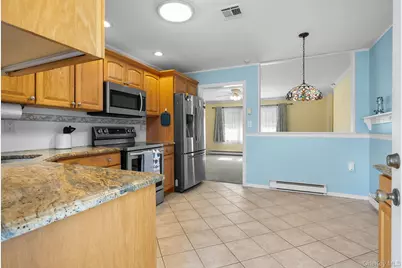 54 Aylesbury Court #B, Ridge, NY 11961 - Photo 3