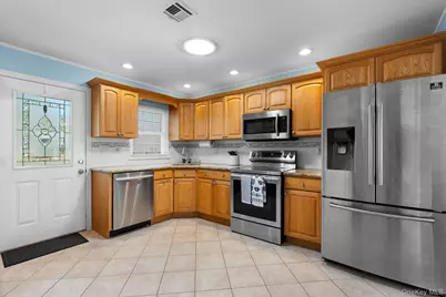 54 Aylesbury Court #B, Ridge, NY 11961 - Photo 5