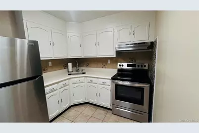 395 Woodbridge Drive #395E, Ridge, NY 11961 - Photo 9