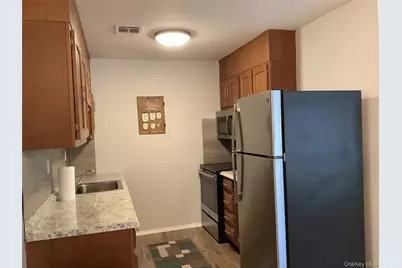 201 Newcastle Court #A, Ridge, NY 11961 - Photo 3