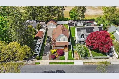 77 Scudder Avenue, Copiague, NY 11726 - Photo 1