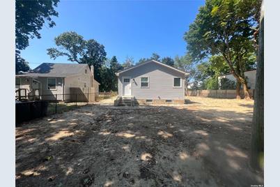 94 Huguenot Drive, Mastic Beach, NY 11951 - Photo 1