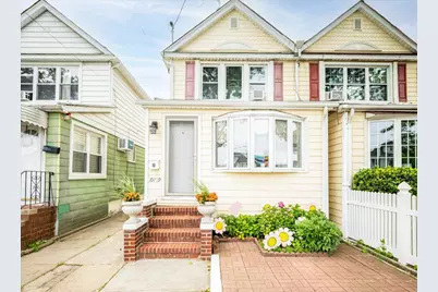 10719 Sutter Avenue, Ozone Park, NY 11417 - Photo 1