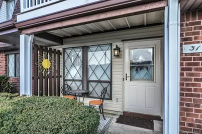 31 Cambridge Drive W, Copiague, NY 11726 - Photo 1