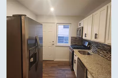 79-56 77 Avenue, Glendale, NY 11385 - Photo 1