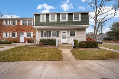 252 Village Drive #252, Hauppauge, NY 11788 - Photo 1