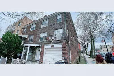 74-02 Woodside Avenue, Elmhurst, NY 11373 - Photo 1