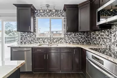 10979 Grange Creek Drive, Thornton, CO 80233 - Photo 11