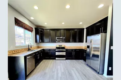 9695 Nucla Street, Commerce City, CO 80022 - Photo 5