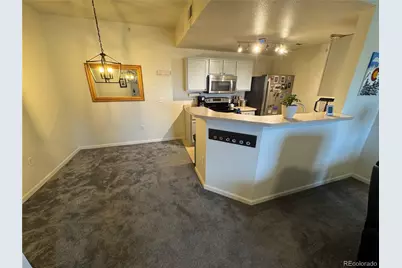 7440 S Blackhawk Street #12-304, Englewood, CO 80112 - Photo 5