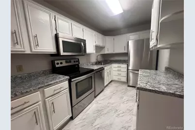 3184 S Heather Gardens Way #403, Aurora, CO 80014 - Photo 1