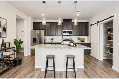 6153 N Ceylon Street #10-303, Denver, CO 80249 - Photo 1