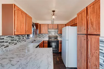 14451 Andrews Drive, Denver, CO 80239 - Photo 23