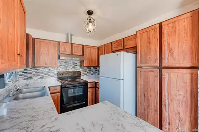 14451 Andrews Drive, Denver, CO 80239 - Photo 21