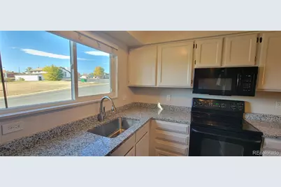 8770 Rainbow Avenue #A, Denver, CO 80229 - Photo 5