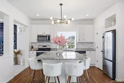 4003 N Quatar Court, Aurora, CO 80019 - Photo 13