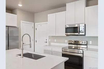 6153 N Ceylon Street #102, Denver, CO 80249 - Photo 5