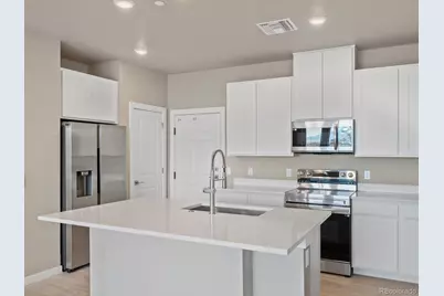 6153 N Ceylon Street #102, Denver, CO 80249 - Photo 3