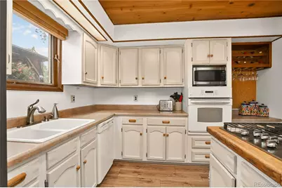 7033 Silverhorn Drive, Evergreen, CO 80439 - Photo 9