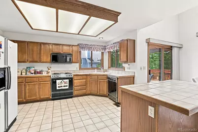 9877 Falcon Creek Drive, Highlands Ranch, CO 80130 - Photo 11