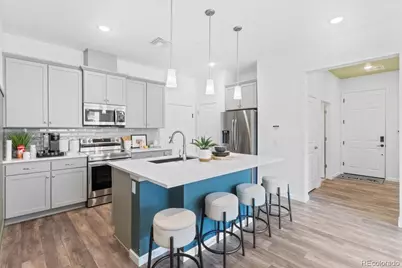 6153 N Ceylon Street #9-102, Denver, CO 80249 - Photo 1