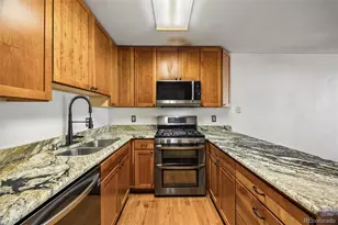 9666 E Arkansas Pl, Denver, CO 80247 - Photo 7
