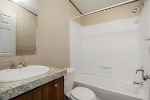 1104 Mac Davidson Cir, Dacono, CO 80514 - Photo 19