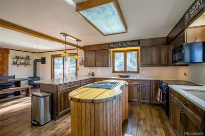 6997 Skunk Alley, Evergreen, CO 80439 - Photo 13