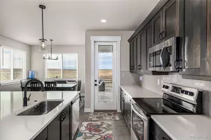 7377 Van Sickle St, Strasburg, CO 80136 - Photo 15