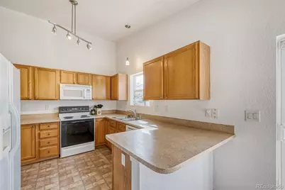 1055 Sunrise Circle, Dacono, CO 80514 - Photo 9