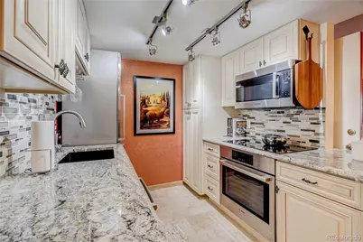 8335 Fairmount Drive #105, Denver, CO 80247 - Photo 9