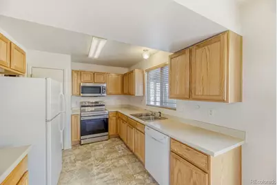 5093 Helena Court, Denver, CO 80239 - Photo 11