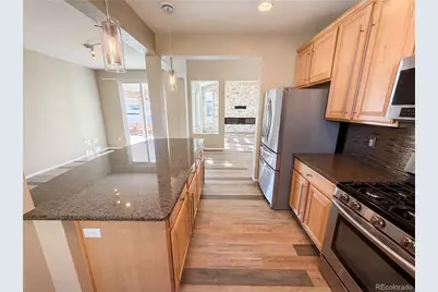 10049 Southlawn Circle, Commerce City, CO 80022 - Photo 13
