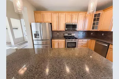 10049 Southlawn Circle, Commerce City, CO 80022 - Photo 11
