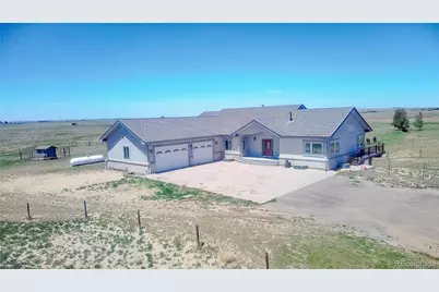 58989 E Chenango Place, Strasburg, CO 80136 - Photo 1