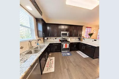 1973 Basil Street, Strasburg, CO 80136 - Photo 7