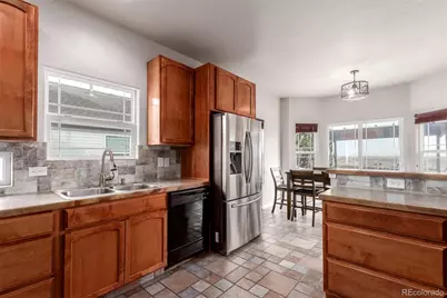 1210 Glen Creighton Drive, Dacono, CO 80514 - Photo 11