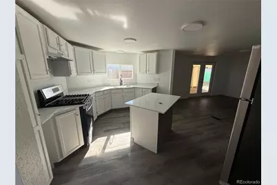 1421 Macpool Street, Dacono, CO 80514 - Photo 11