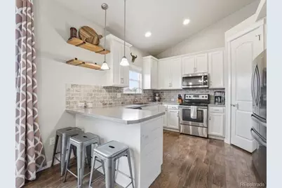1106 Osprey Way, Wiggins, CO 80654 - Photo 7
