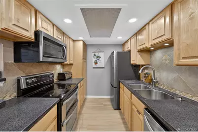 8225 Fairmount Drive #203, Denver, CO 80247 - Photo 7