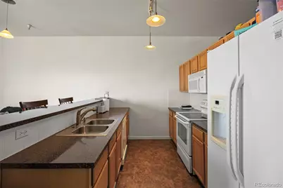 15475 Andrews Drive #407, Denver, CO 80239 - Photo 11
