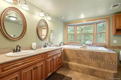 8240 Tim Tam Trail, Evergreen, CO 80439 - Photo 19