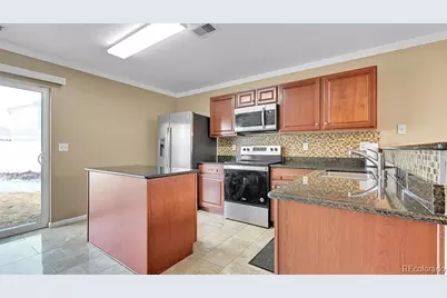 5556 Flanders Way, Denver, CO 80249 - Photo 9