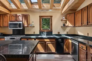 2667 Witter Gulch Rd, Evergreen, CO 80439 - Photo 11