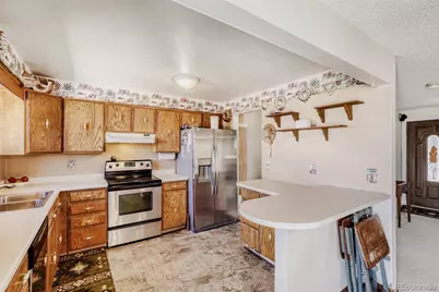 9018 W 77th Place, Arvada, CO 80005 - Photo 11