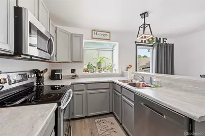9713 W Chatfield Avenue #G, Littleton, CO 80128 - Photo 13